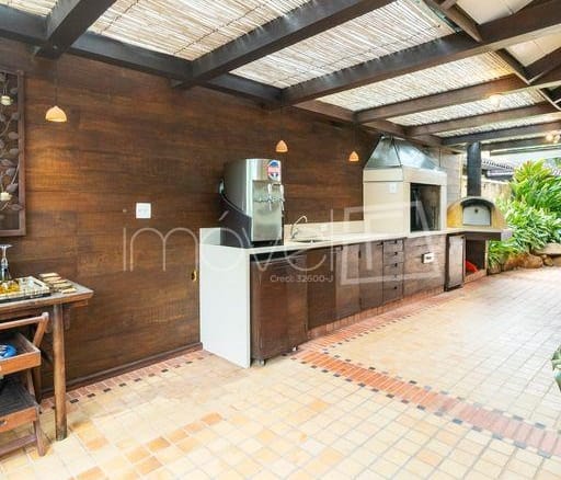 Casa de Condomínio para Venda com 6 quartos, em Camburi com 600m²