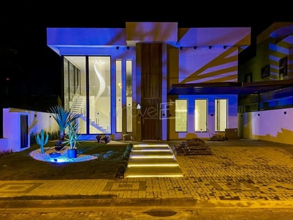 Casa à Venda em Massaguaçu no Condomínio Costa Nova Residence com 4 quartos e 357m²