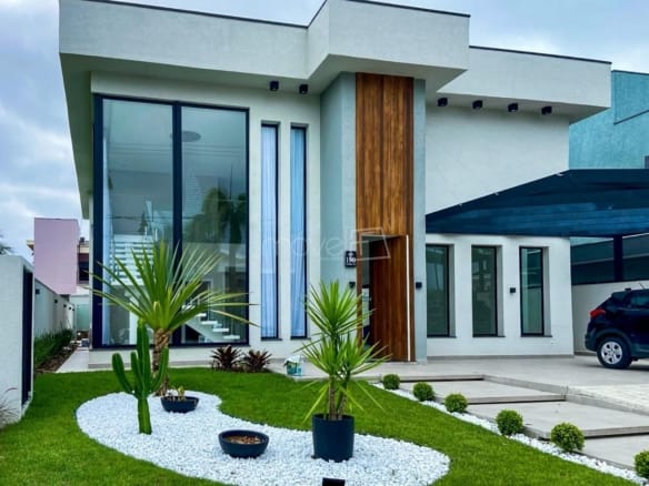 Casa à Venda em Massaguaçu no Condomínio Costa Nova Residence com 4 quartos e 357m²
