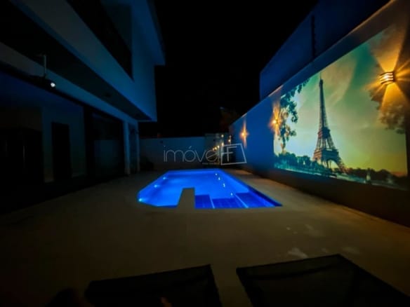 Casa à Venda em Massaguaçu no Condomínio Costa Nova Residence com 4 quartos e 357m²