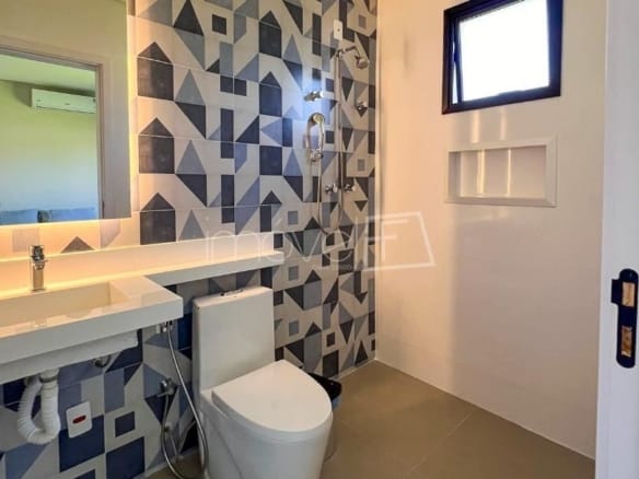 Casa à Venda em Massaguaçu no Condomínio Costa Nova Residence com 4 quartos e 357m²