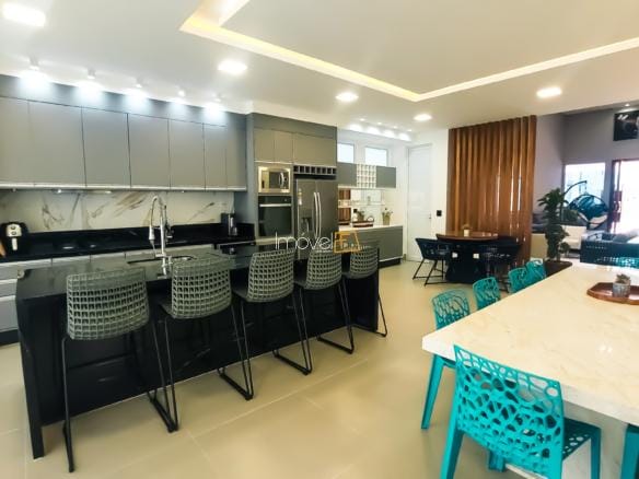 Casa para venda no Condomínio Costa Nova Residence em Massaguaçu com 4 suítes e 200m²