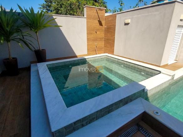 Casa para venda no Condomínio Costa Nova Residence em Massaguaçu com 4 suítes e 200m²