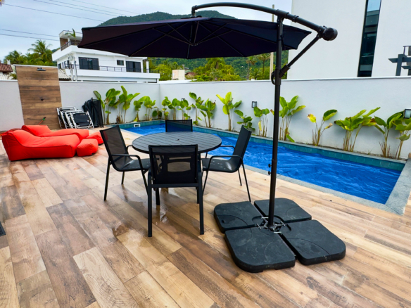 Casa Frente Mar com 5 Suítes e Piscina Aquecida na Praia da Lagoinha – Ubatuba