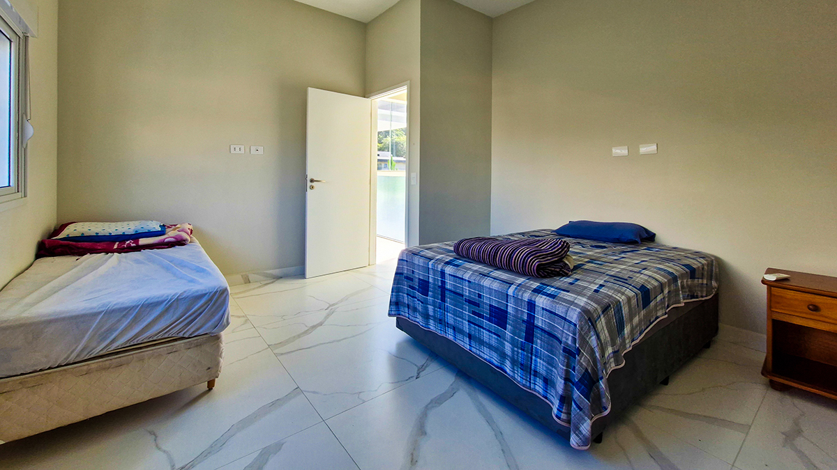 Casa à Venda no Condomínio Costa Nova Residence, em Massaguaçu com 4 suítes e 300m²