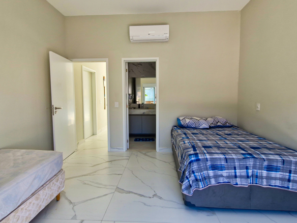 Casa à Venda no Condomínio Costa Nova Residence, em Massaguaçu com 4 suítes e 300m²